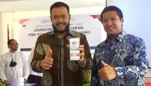 Asyik! Pembayaran PBB-P2 di Padang Panjang Kini Bisa Melalui Aplikasi Tokopedia 1 Fadly Amran, BBA Datuak Paduko Malano luncurkan pembayaran Pajak Bumi dan Bangunan Perdesaan dan Perkotaan (PBB-P2) bersama Bank Nagari melalui aplikasi Tokopedia
