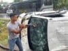 Mobil Pengawalan Uang Bank Terguling di Jalan Lintas Batang Gasan