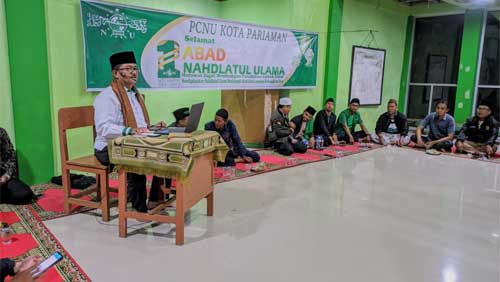 Rais Syuriah KH. M. Nur sedang menyampaikan tausiyah