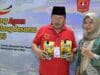 Andri Warman saat menemui pelaku UMKM yang ikut meramaikan silaturahmi Pemkab Agam dengan perantau, di UIN Sjech M Djamil Djambek Bukittinggi