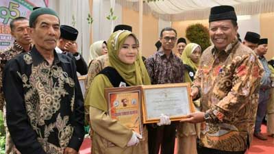 Kepala Dinas Pendidikan dan Kebudayaan Agam, Isra saat pelepasan tamatan MTI Candung
