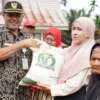 Penyerahan Bantuan Pangan di Kecamatan Sangir Jujuan
