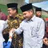 Asisten Administrasi Umum Sekretaris Daerah, Adrinaldi secara resmi melepas pawai khatam Alquran ke-79 di TPA/MDA Mahadul Islami Ampang Gadang, Nagari Ampang Gadang, Kecamatan Ampek Angkek