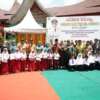 Pembagian seragam sekolah gratis untuk siswa SD dan SMP di SMP N 4 Solok Selatan