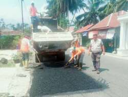 Perbaikan Jalan Poros Manggopoh - Padang Luar
