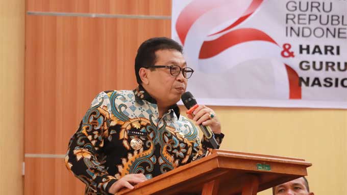 Pj Wako Payakumbuh Buka Seminar Nasional dan Penandatanganan MoU antara PGRI dengan Polres 1 Pj Wali Kota Payakumbuh, Jasman