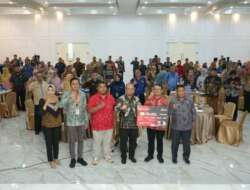 Bupati Asahan Buka Sosialisasi dan Launching Kartu Kredit Pemerintah Daerah