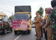 Penjabat Walikota, Zefnihan Melepas Pendistribusian Logistik Pemilu 2024 Di Pelataran Kpu Kota Sawahlunto