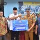 Bupati Dharmasraya Salurkan Bantuan bagi Korban Bencana di Pesisir Selatan