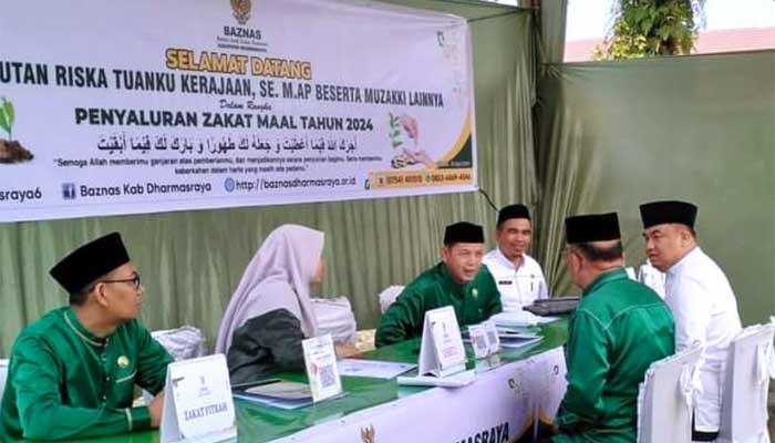 Bupati, Kepala OPD dan Pengusaha Serahkan Zakat Mal ke Baznas Dharmasraya