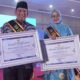 Pj Wako dan Pj Ketua TP-PKK Padang Panjang Terima Anugerah Ayah dan Bunda GenRe Pengayom