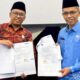 Kepala Stasiun RRI Bukittinggi, Budi Suwarno bersama Kepala Dinas Komunikasi dan Informatika Kabupaten Agam, Syatria