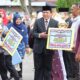 Wakil Ketua DPRD Sumbar Suwirpen Suib Hadiri Penurunan Bendera HUT RI ke-79