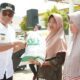 Pjs. Bupati Solok Selatan, Adib Alfikri serahkan bantuan beras pemerintah