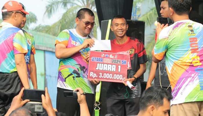Pj Bupati Aswarodi serahkan hadiah Fun Run HUT Korpri Lampung Utara ke-53