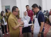 Pjs Wali Kota Bukittinggi Buka Lomba HUT Korpri ke-53 dan Gerakan Pangan Murah