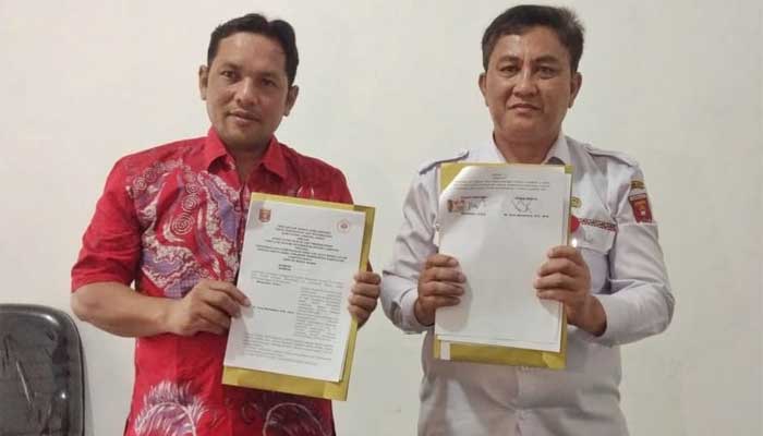 Penandatanganan Memorandum of Understanding (MoU) Diskominfo Lampung Barat dengan Pusat Hukum dan Pembangunan Fakultas Hukum Unila terkait verifikasi data perusahaan pers dan data media