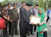 Sekda Adlisman Jadi Irup Peringatan Hari Pahlawan dan Hari Kesehatan Nasional di Dharmasraya