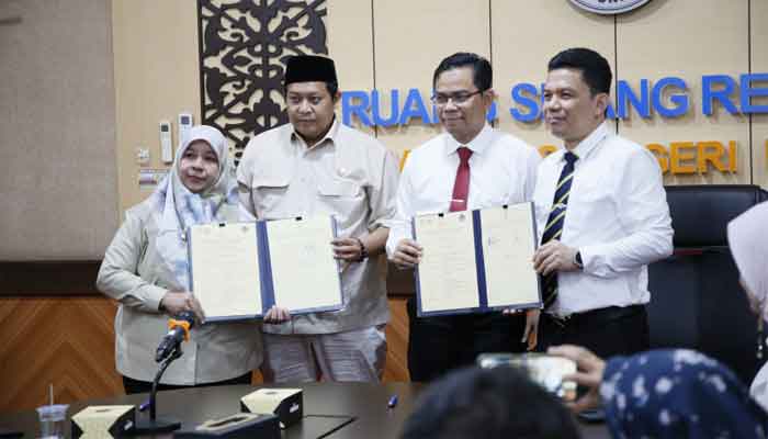 Penandatanganan kesepakatan Kerja Sama antara, UNP dengan KP2MI