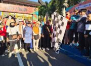 Gubernur Sumbar, Mahyeldi bersama Wakil Wali Kota Padang, Maigus Nasir, membuka acara Jalan Sehat Bersama PT Garam Lososa dan Segi Tiga 'G'