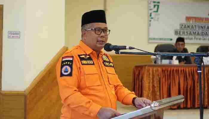 Sekretaris Daerah Kabupaten Solok Selatan, H. Syamsurizaldi, saat membuka acara Optimalisasi Pengumpulan Zakat, Infaq, Sedekah (ZIS)