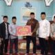 Tim IV Safari Ramadan Kabupaten Solok serahkan bantuan kepada pengurus Masjid Nurul Yaqin Pasar Usang, Nagari Koto Gadang Guguk, Kecamatan Gunung Talang