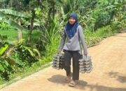 Tri Asih Berharap Pembangunan Jalan TMMD ke-128 Bisa Melancarkan Distribusi MBG di Krangean