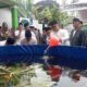 Ketua PCNU Kabupaten Malang, Jawa Timur, KH Hamim Kholili meresmikan usaha usai pelantikan pengurus MWC NU Kecamatan Wajak periode 2025-2030