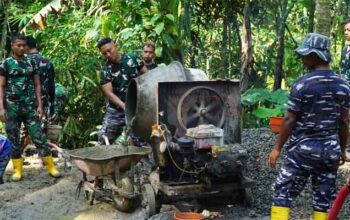 Putaran Molen Jadi Irama Penyemangat Pembangunan Rabat Jalan TMMD ke-128 di Desa Krangean