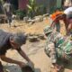 Kejar Akses Penghubung Desa, Satgas TMMD ke-128 dan Warga Kerjakan Rabat Beton