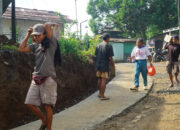 Langkah Penuh Semangat Warga Desa Krangean dalam Pembangunan Sasaran Fisik TMMD ke-128
