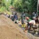 Gotong Royong Lintas Instansi Percepat Pembangunan Jalan TMMD ke-128 di Krangean