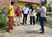 Anggota DPRD Bukittinggi Elfianis Serahkan Pokir Perbaikan Drainase Pasar Pagi Puhun Tembok