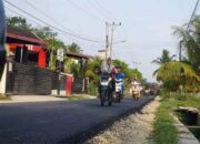 Jalan Belakang Eks RSUD Sungai Dareh Kembali Diaspal, Warga Apresiasi Bupati Dharmasraya