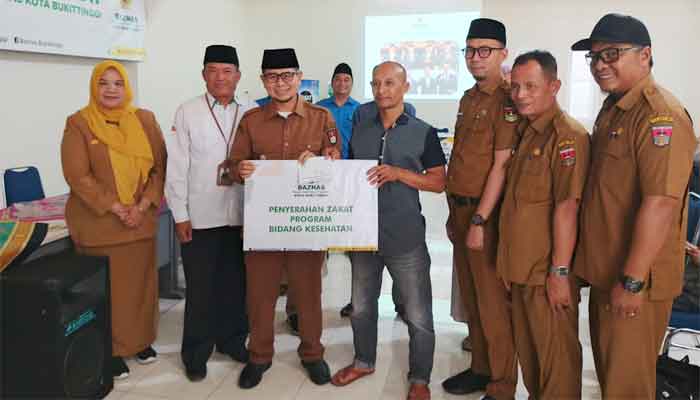 Pemko Bukittinggi bersama Baznas Salurkan Zakat dan Infak kepada 61 Mustahik 1 Pemko Bukittinggi bersama Baznas Salurkan Zakat kepada 61 Mustahik