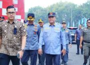 Bupati Muba Hadiri Apel Akbar Satlinmas di Palembang