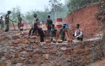 Satgas TMMD Kodim 0306/50 Kota Terus Tuntaskan Pembukaan Jalan Jorong Buluh Kasok