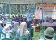 Sekda Dharmasraya Saksikan Tumbang Chipping Program Peremajaan Sawit Rakyat Tahap III di KUD Lubuk Karya