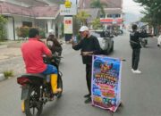 Komunitas Wartawan Peduli Sawahlunto bersama IPJI Bagikan Ratusan Masker kepada Masyarakat