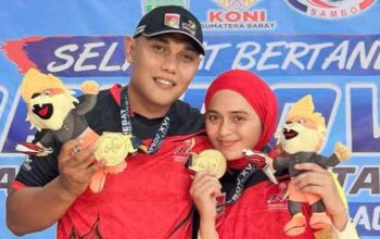Suami Istri Husnul Amri dan Rezy Alvalery persembahkan Medali Emas Cabor Sambo untuk kontingen Bukittinggi pada Porprov Sumbar XVI tahun 2026